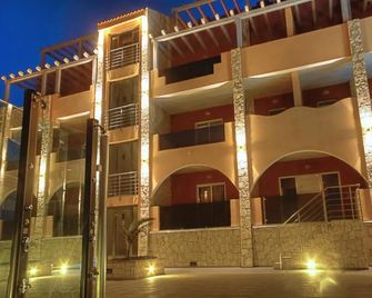 Pôr do Sol - Praia - Building