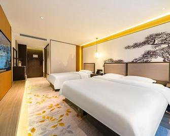 Shen Qi Hotel - Tai’an - Bedroom