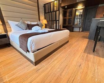 Northin Hotel - Kolkata - Bedroom