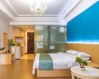 Marriott Hotel Apartment (Guilin Hi-tech Wanda) - Guilin - Schlafzimmer