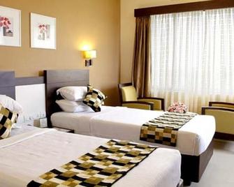 Cochin Seaport Hotel - Kochi - Bedroom