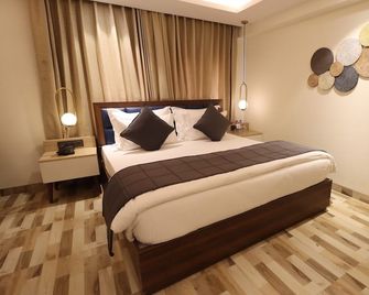 Mastiff Hotel Dhanbad - Dhanbād - Bedroom