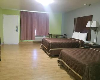 Simple Rewards Inn - רוזוול - חדר שינה