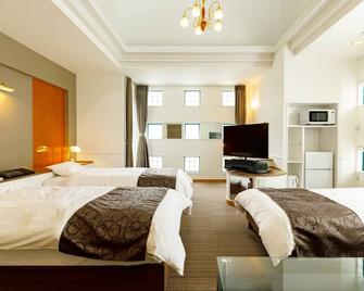 Beppukankouhotelace - Беппу - Спальня