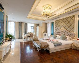 Xi'erdun Roman Holiday Hotel - Lishui - Habitación