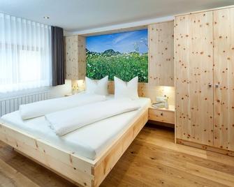 Aparthotel Brunnenhof - Damüls - Schlafzimmer