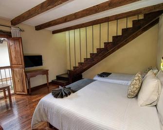 Hotel San Marcos - סן קריסטובל דה לס קאסאס - חדר שינה