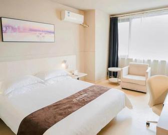 Jinjiang Inn Zhenjiang Jurong Renmin Rd - Zhenjiang - Bedroom