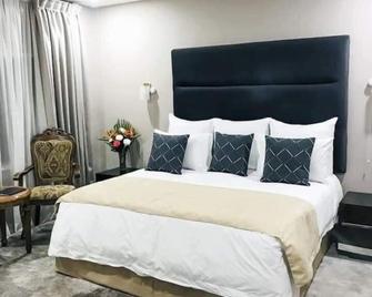 Mukuba Hotel - Ndola - Bedroom