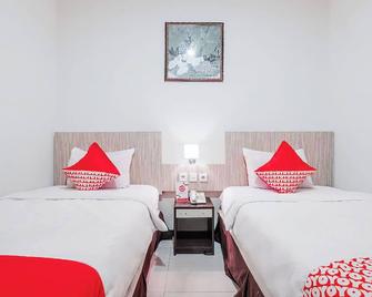 Agraha Andalas Hotel - Makassar - Bedroom