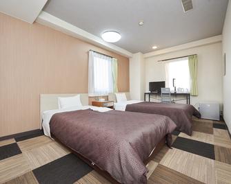 Hotel Select Inn Utsunomiya - Utsunomiya - Schlafzimmer