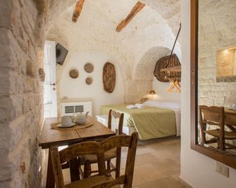 Trulli Holiday Albergo Diffuso - אלברובלו - חדר אוכל