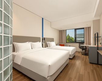 Holiday Inn Express Beijing Airport Zone By IHG - בייג'ין - חדר שינה