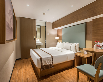 Jtour Inn Nanning East Railway Station - Nanning - Soveværelse