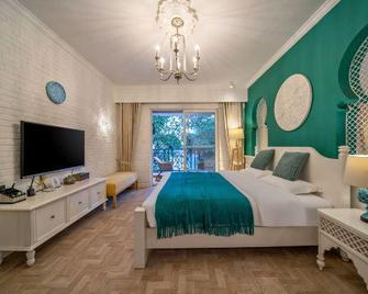 Shuixianshan Guesthouse - Сішуанбаньна - Спальня