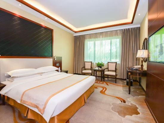 Golden Star Holiday Hotel - שה-ג'יאג'וואנג - חדר שינה