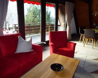 Holiday house 'Rehberg' - cottage, shower, toilet, 2 bedrooms - Leinsweiler - Huiskamer