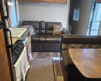 Camper with Private Pond - Many - Living room