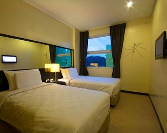 Go Hotels Dumaguete - Dumaguete - Soverom