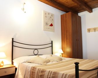 Cuscino e Cappuccino B&B - אלגרו - חדר שינה