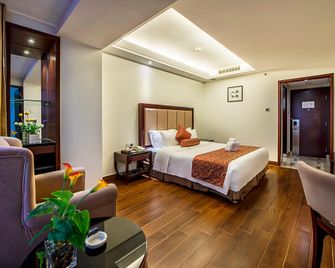 Haikou Baofa Shengyi Hotel - Haikou - Habitación