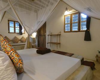 Bahari Beach Bungalows - Jambiani - Schlafzimmer