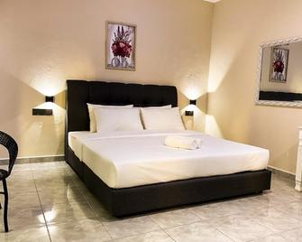 Tokman Inn - Pantai Cenang - Habitación