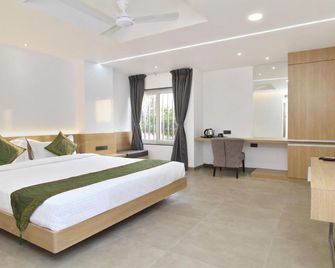 Treebo City Inn, Satara - Sātāra - Bedroom