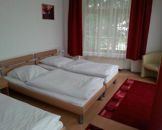 Picobello Pension - גרליץ - חדר שינה