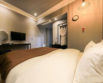 Merrymud Hotel - Boryeong - Camera da letto