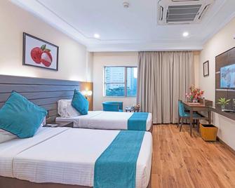 Indismart Hotel - Kolkata - Bedroom