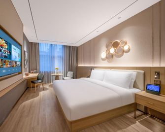 Orange Hotel (Yan'an 3rd Road, Qingdao Wusi Square) - Qingdao - Bedroom
