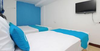 Airy Japaris Medan Area Rahmadsyah 293 - Medan - Bedroom