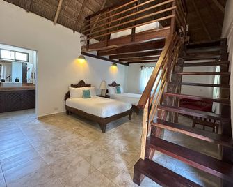 Na Balam Hotel - איסלה מוחרס - חדר שינה