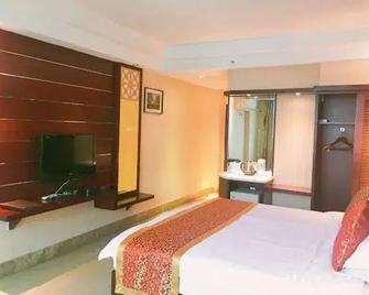 Wandu Hotel - Wanning - Bedroom