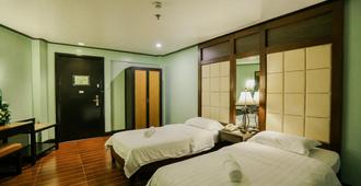Business Inn - Bacolod - Bedroom