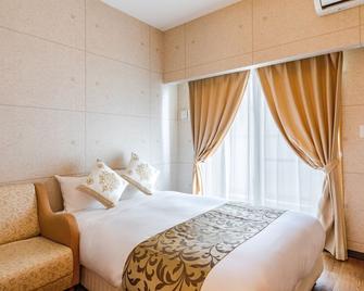 Condominium Hotel Likka in Nago - Nago - Camera da letto
