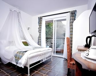 Lijiang Escape Inn - Lệ Giang - Phòng ngủ