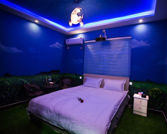 Tianlai Four Seasons Cinema Hotel - Xinxiang - Slaapkamer