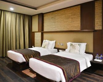 Premier Tamanna Hotel Hinjawadi Pune - Hinjewadi - Slaapkamer