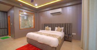 Yogved Hospitality & Resort - Rishikesh - Phòng ngủ