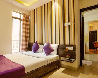 Magnus Calypso Suites - Pune - Bedroom