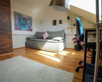 Stadtblick vom Herrengut - Baden-Baden - Living room