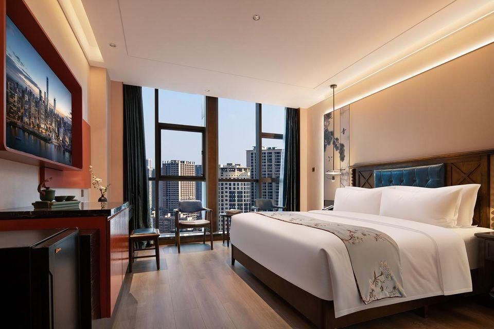 Exotic Hotel - צ'נגשה - חדר שינה