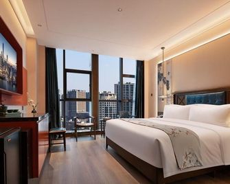 Exotic Hotel - Changsha - Habitación