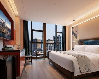 Exotic Hotel - Changsha - Habitación