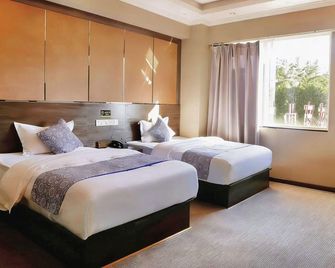 Jinxi Hotel - Kunming - Chambre