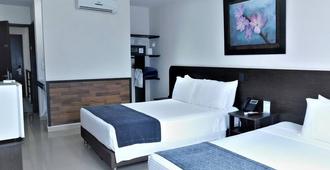 Hotel Acqua Medellín - Medellín - Kamar Tidur