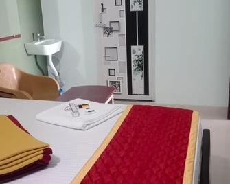 Thanmayas Residency - Periyakulam - Bedroom