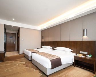 Xinhua Hotel Chongqing Kaizhou - Dazhou - Bedroom